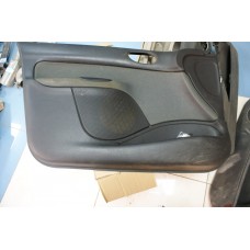 Обшивка двери передней левой Peugeot 206 